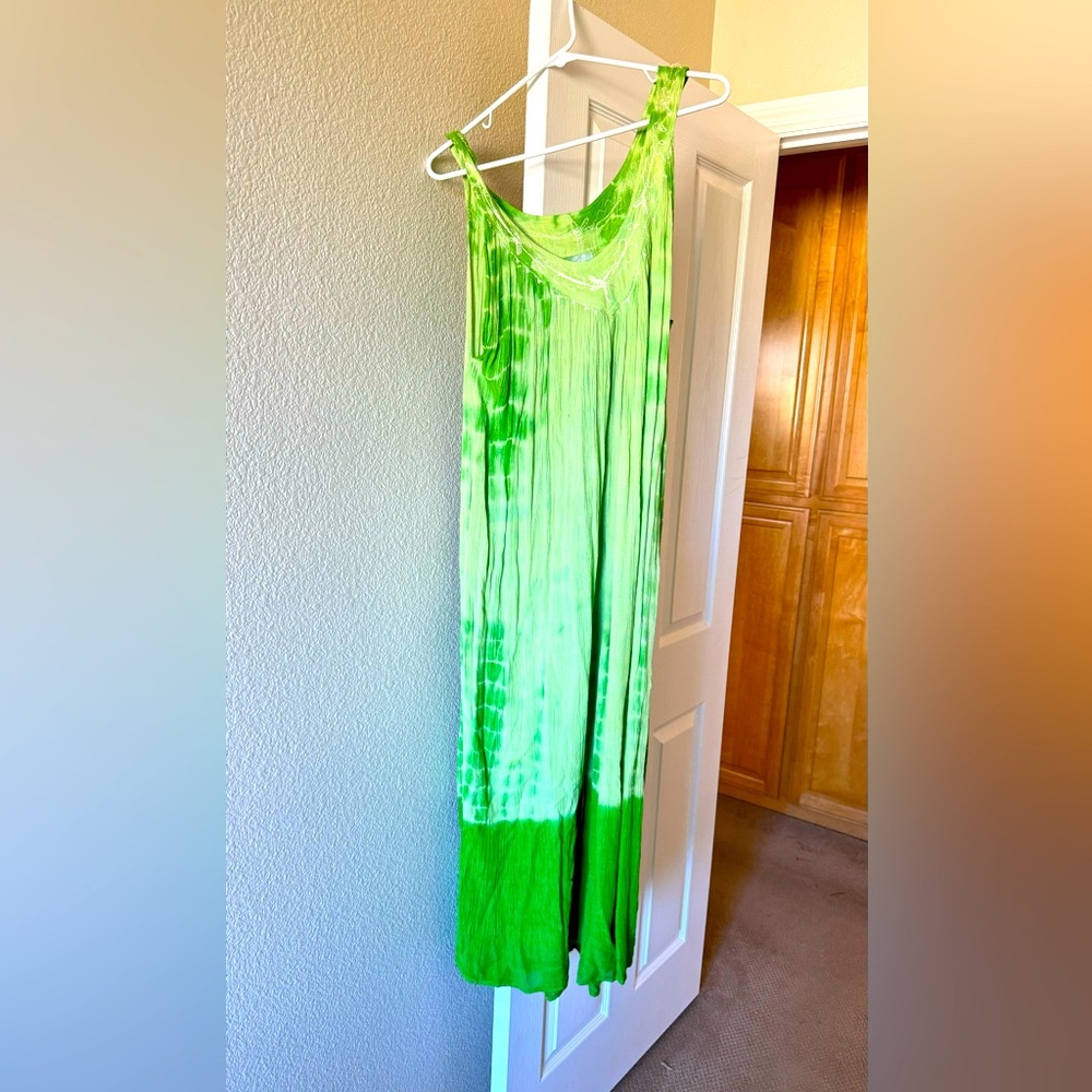 Long sleeveless dress  green in color needs new home